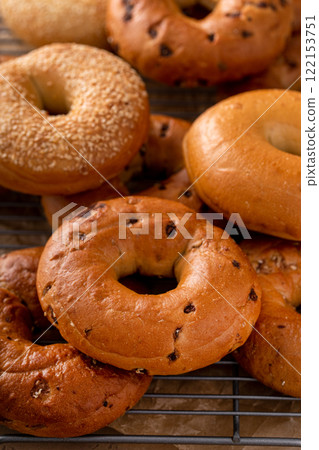 Freshly baked bagels ready to eat for breakfast, sesame, cinnamon and plain 122153751