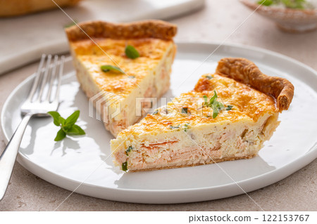 Salmon and cheese quiche freshly baked for breakfast Salmon and cheese quiche freshly baked for breakfast 122153767