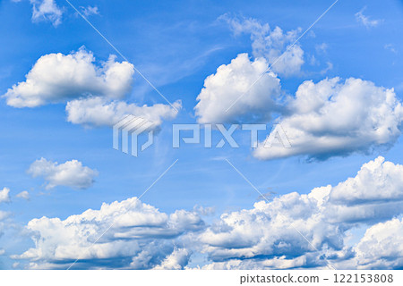 White clouds in a bright blue sky. The beauty of the nature White clouds in a bright blue sky. The beauty of the nature 122153808