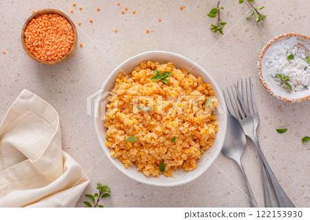 Cooked red lentils in a bowl, healthy vegan protein source 122153930