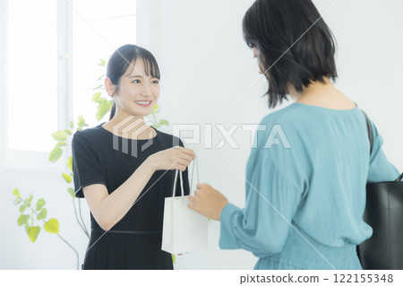 A beauty consultant applying makeup A beauty consultant applying makeup 122155348