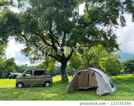 Solo camping at an auto campsite in summer 122155356
