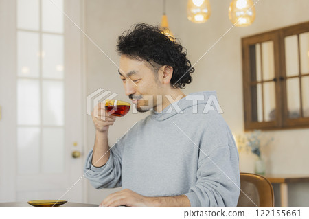 A man in a cafe 122155661