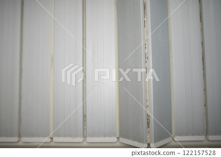 Black mold growing on the bathtub lid Black mold growing on the bathtub lid 122157528