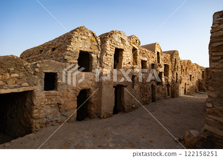 Remains of traditional mudbrick granaries in Ksar Daghar, Tunisia 122158251