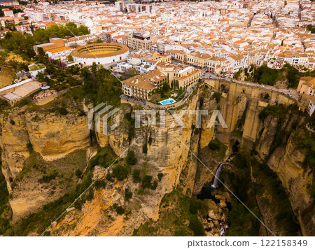 Rocky landscape of Ronda city with Puente Nuevo Bridge and buildings 122158349