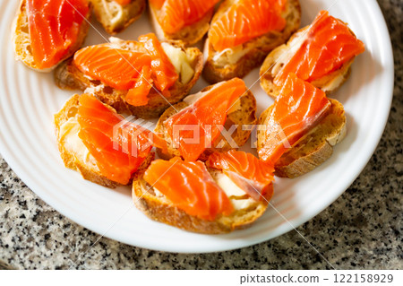 Sandwiches with salmon and butter 122158929