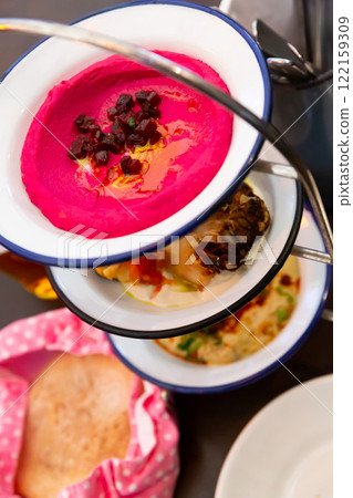 Typical Balkan mezze trio, set of three appetizers Typical Balkan mezze trio, set of three appetizers 122159309
