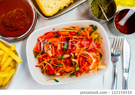 Seasonal vegetable salad with carrot and cucumber 122159310