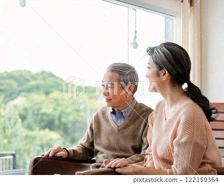 Family members consulting about nursing care for elderly parents Family members consulting about nursing care for elderly parents 122159364