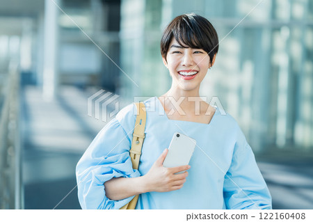 A casual business woman. 122160408
