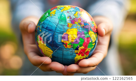 Human hands gently hold the Earth. The concept of saving the planet, Earth Day, global warming awareness, and World Environment Day. Generative AI. 122162565
