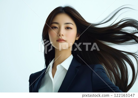Business woman with long hair Business woman with long hair 122163147