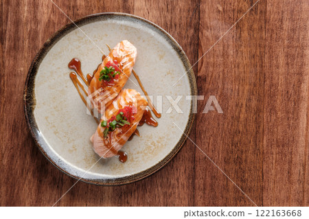 Seared Salmon Sushi with Teriyaki Sauce 122163668