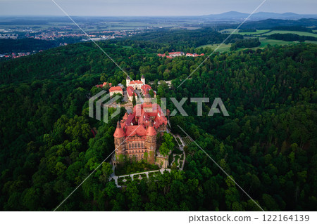 Aerial view of historic medieval castle surrounded by forest. Ksiaz castle in Walbrzych, Poland 122164139
