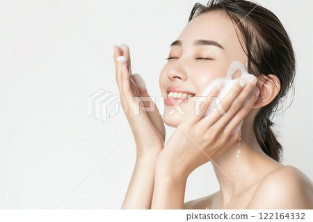 A beautiful Japanese woman with beautiful skin washing her face (skin care, beautiful skin, model) A beautiful Japanese woman with beautiful skin washing her face (skin care, beautiful skin, model) 122164332