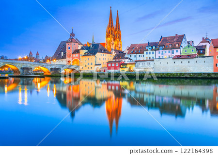Regensburg, Germany. Historical downtown and the Cathedral, Danube River water reflection. Regensburg, Germany. Historical downtown and the Cathedral, Danube River water reflection. 122164398