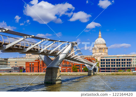 London, United Kingdom. Millennium Bridge over Thames River and Saint Paul Anglican cathedral dome London, United Kingdom. Millennium Bridge over Thames River and Saint Paul Anglican cathedral dome 122164420