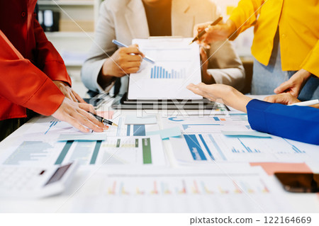 Business people making presentation with his colleagues and business smartphone, tablet digital computer Business people making presentation with his colleagues and business smartphone, tablet digital computer 122164669