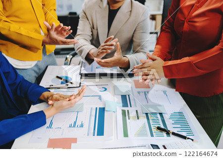 Close up on hands of business people join together their hands together Close up on hands of business people join together their hands together 122164674