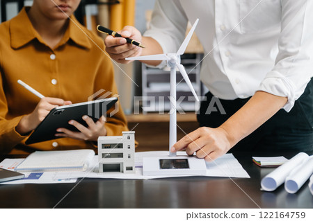 business people working and green renewable energy worker interface. Concept of sustainability  business based on renewable in office 122164759