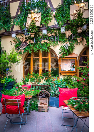 Strasbourg, France - 03rd December 2017 - Street cafe with winter decorations, Marche de Noel travel destination in Alsace. 122165053