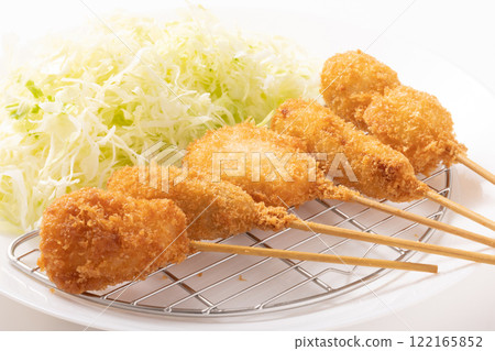 Assorted kushikatsu skewers (meat-stuffed eggplant, lotus root, potato, quail egg, pork thigh) 122165852