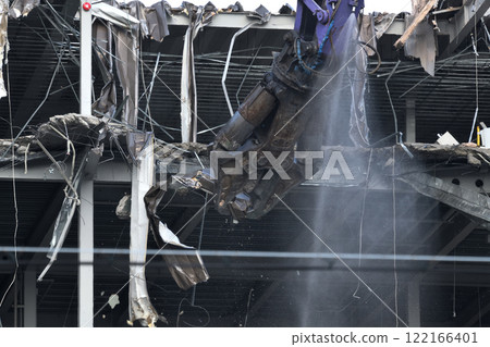 Factory demolition site: A scene of a large-scale press in operation 122166401