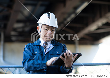 Veteran construction manager and architect Veteran construction manager and architect 122166447