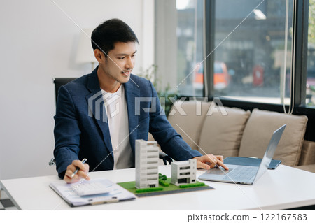 Considering buying a home, investing in real estate. Broker signs a sales agreement. agent, lease agreement, successful deal Considering buying a home, investing in real estate. Broker signs a sales agreement. agent, lease agreement, successful deal 122167583