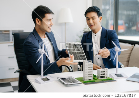 Discussion among businesspeople on the latest developments in solar cell panel technology and Solar Energy Environment city Concept. Discussion among businesspeople on the latest developments in solar cell panel technology and Solar Energy Environment city Concept. 122167817