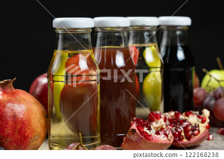 Apple, pomegranate, white wine and balsamic vinegars among fruits 122168238