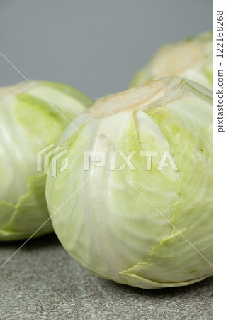 Whole heads of fresh white cabbage close-up. Whole heads of fresh white cabbage close-up. 122168268