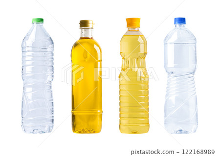 Water and Vegetable oil in different bottle for cooking isolated on white background. Water and Vegetable oil in different bottle for cooking isolated on white background. 122168989