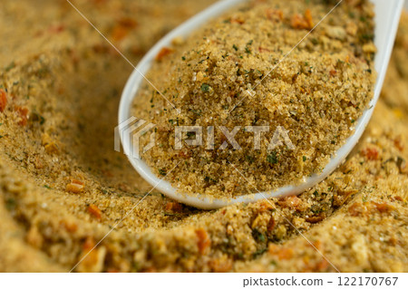 Natural seasoning with flavor enhancer, dried vegetables and salt 122170767