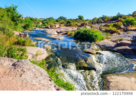View of Tokovsky waterfalls on the Kamenka river in Dnipropetrovsk region, Ukraine View of Tokovsky waterfalls on the Kamenka river in Dnipropetrovsk region, Ukraine 122170998