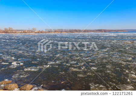 View of a lake with melting ice at spring 122171261