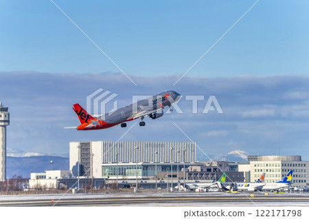 New Chitose Airport in winter, airplane taking off, Chitose, Hokkaido New Chitose Airport in winter, airplane taking off, Chitose, Hokkaido 122171798