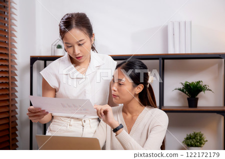 Two young asian businesswoman planning and strategy about marketing and financial. 122172179