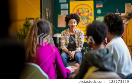 A school psychologist provides counseling to a diverse group of teenagers during a therapy session. Generated image 122173359