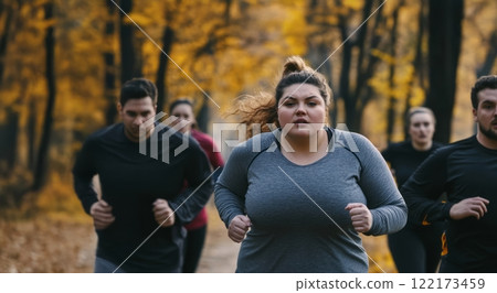 Team of young plus-size men and women running together in the park, training outdoors in autumn. Generated image Team of young plus-size men and women running together in the park, training outdoors in autumn. Generated image 122173459