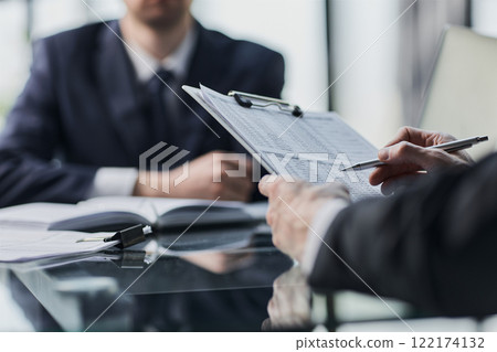 Business team analyzing income charts. Close up.Business analysis and strategy concept. Business team analyzing income charts. Close up.Business analysis and strategy concept. 122174132