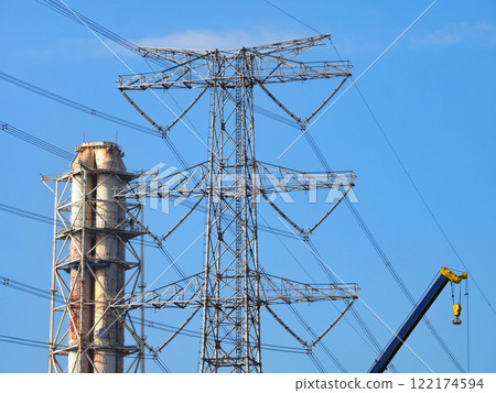 Chimneys and transmission towers of thermal power plants Chimneys and transmission towers of thermal power plants 122174594