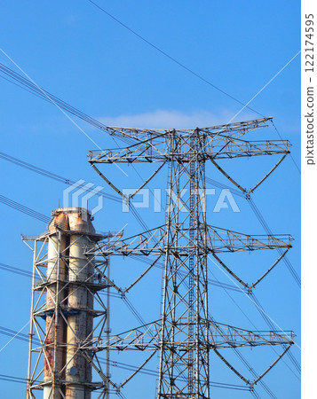 Chimneys and transmission towers of thermal power plants Chimneys and transmission towers of thermal power plants 122174595