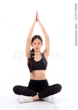 Portrait young asian woman meditating in yoga pose isolated white background. 122175069