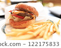 Tasty burger and fries 122175833