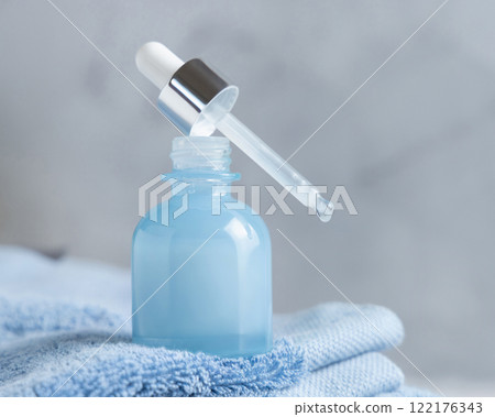 White cream squeeze tube on marble table near green plant and cosmetic bottles, mockup White cream squeeze tube on marble table near green plant and cosmetic bottles, mockup 122176343