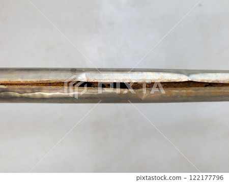 Rusty clothesline 122177796