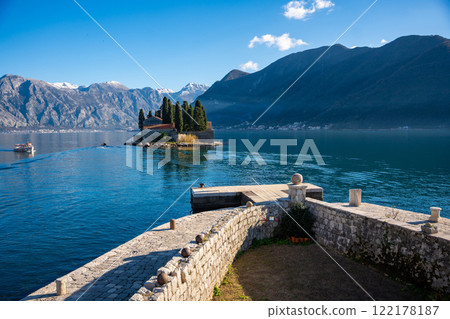 View of Saint George Island from Church of Our Lady of the Rocks near Perast in Montenegro. Boka Kotor bay, Europe.  122178187