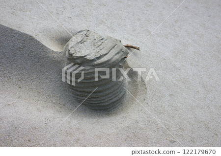 Beautiful sand blocks naturally formed on the beach by the wind Beautiful sand blocks naturally formed on the beach by the wind 122179670